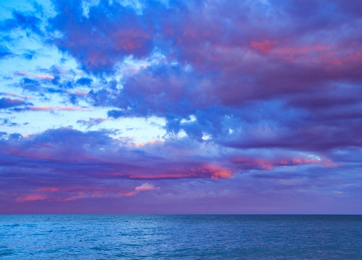 Pink and violet sunset sky over the Sea of Azov near Kyrylivka, Ukraine