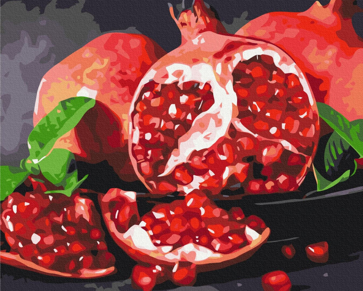 Aufgeschnittener Granatapfel mit rubinroten Kernen, ganzen Früchten und Blättern – Malen nach Zahlen