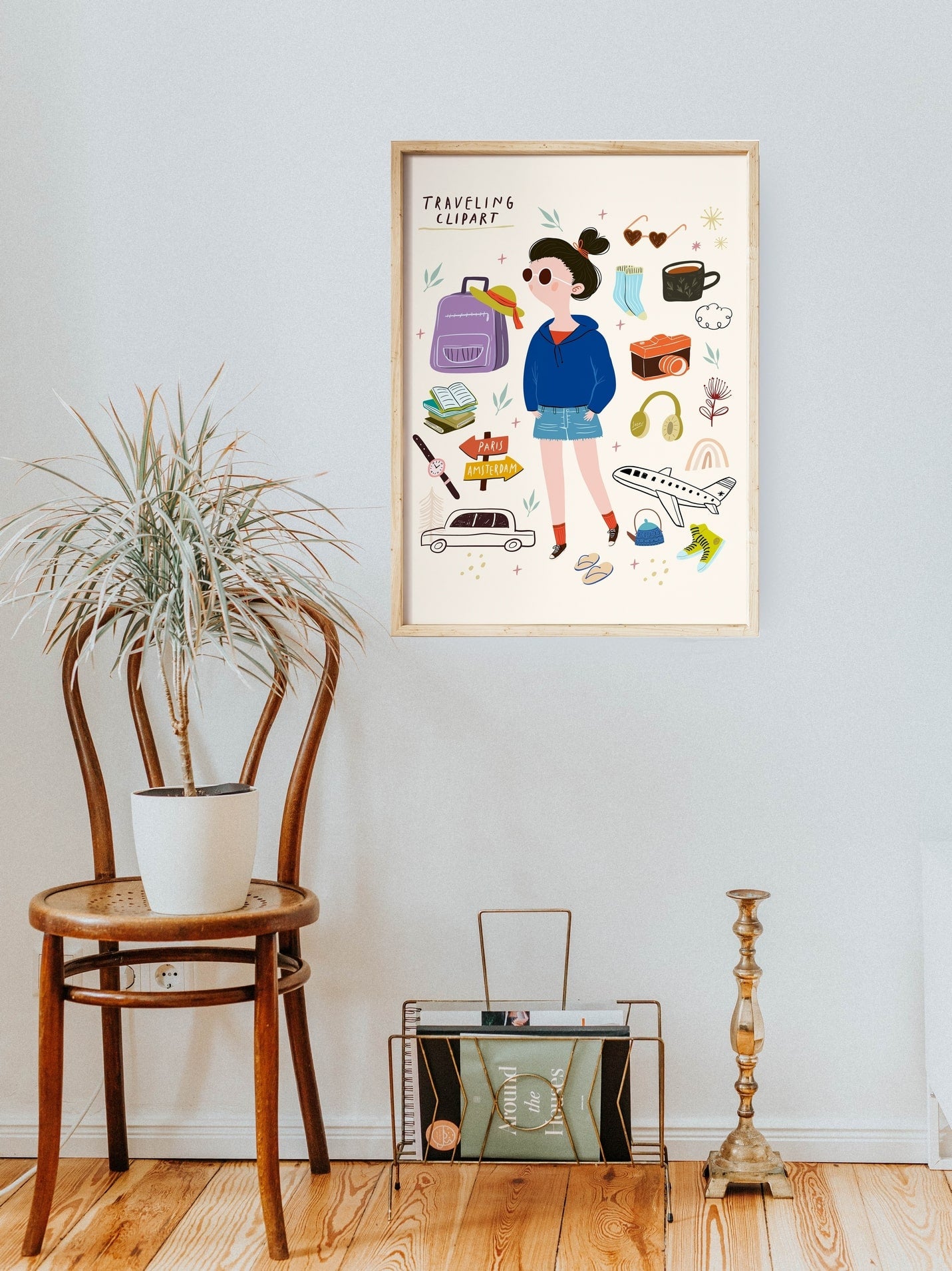 Traveling poster hung above a wooden chair with a potted plant and magazine rack