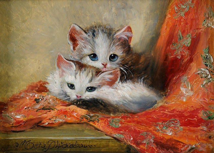 Two tabby-and-white kittens dozing together on coral embroidered cloth