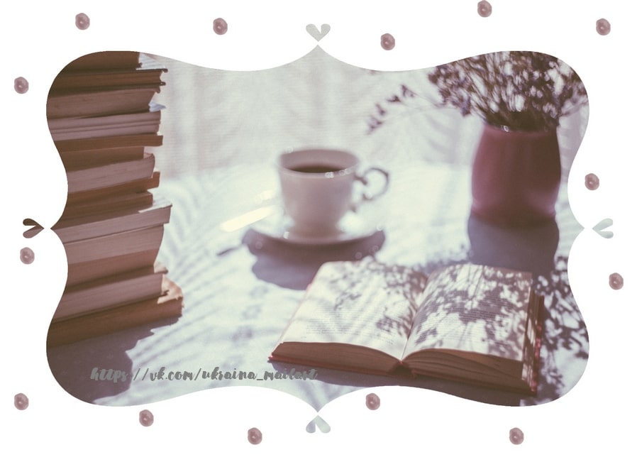 Stack of books, an open novel, a teacup, and dried flowers in sepia-toned light