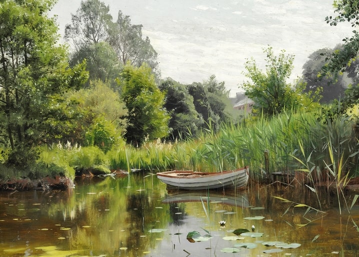 White rowboat moored among reeds on a still, mirror-flat lake