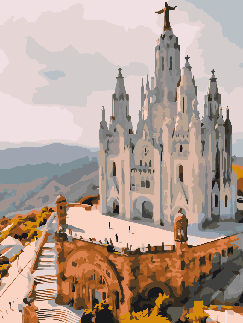 White Gothic spires of Sagrat Cor Church atop Tibidabo hill above Barcelona