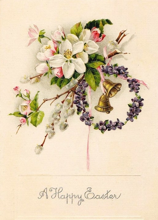 Apfelblütenzweig mit Veilchenkranz und kleinem Messingglöckchen an rosa Band