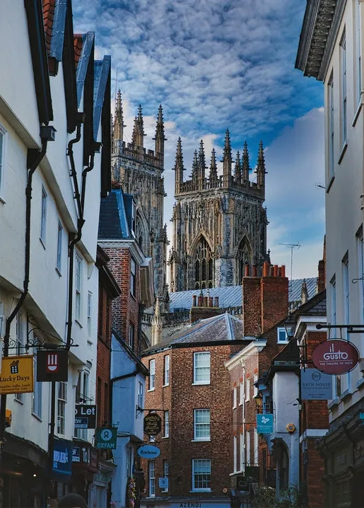 York Minster travel photo postcard featuring historic streets in York, England
