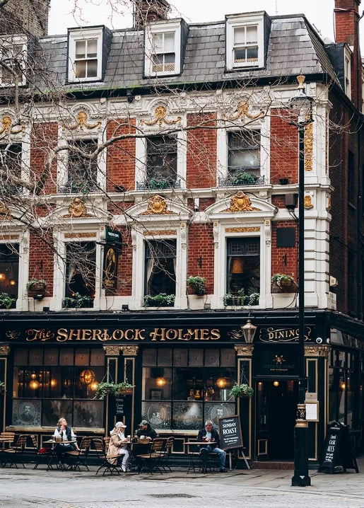 London travel photo postcard featuring The Sherlock Holmes Pub on Northumberland Street in autumn