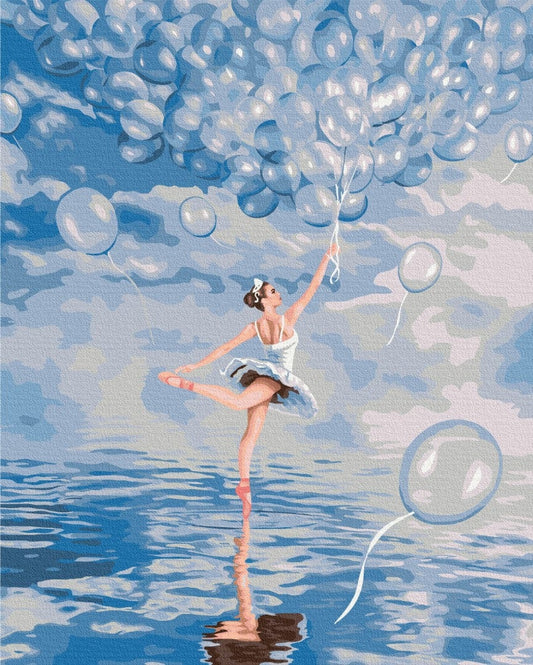 Ballerina auf Spitze steht auf dem Wasser und greift nach hellblauen Luftballons