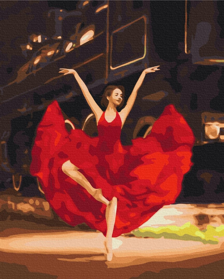 Ballerina im roten Kleid tanzt auf Spitze vor einer alten Dampflokomotive
