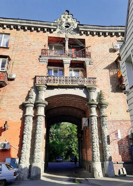 Stone archway with carved Doric columns on Bastion Street, Kyiv