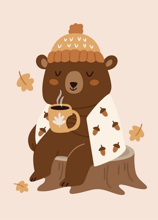 Illustrated brown bear in a knit hat drinking coffee on a tree stump, wrapped in an acorn-print blanket