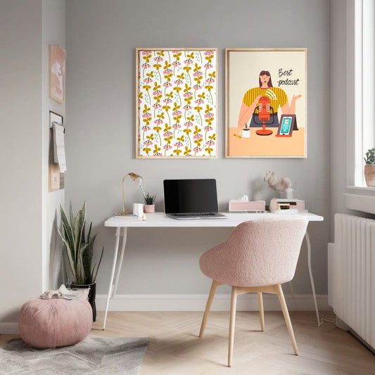 Berry pattern poster hanging above a desk next to a Best Podcast illustration print