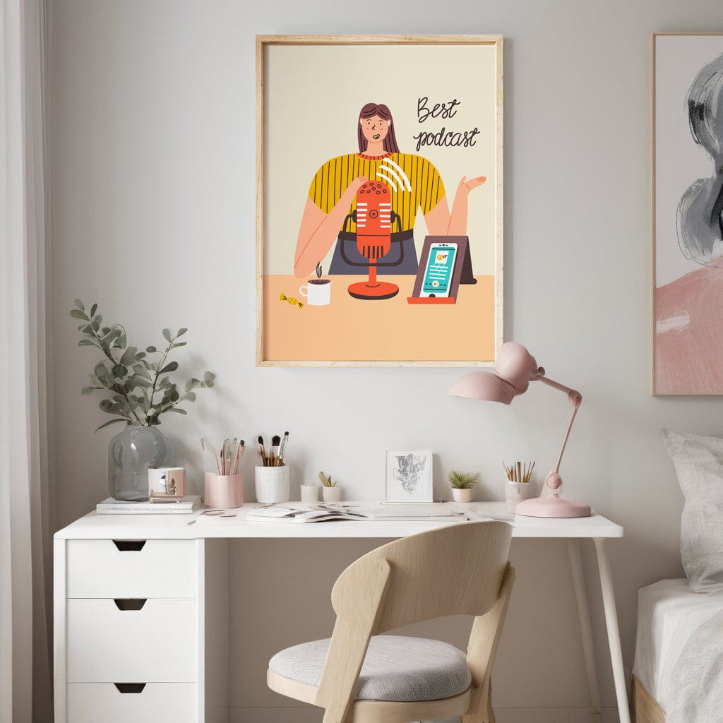 ‘Best podcast’ poster hanging above a desk with a laptop, next to a berry pattern print