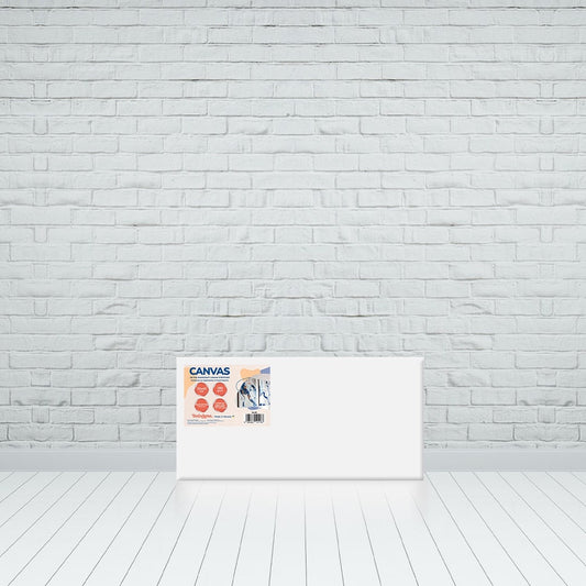 Blank stretched polycotton canvas, 20x40 cm, leaning against a white brick wall