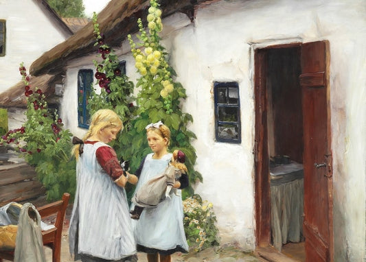 Two girls in white aprons comparing dolls by a hollyhock-covered cottage wall