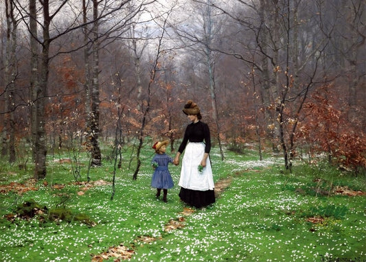 Mother and daughter walking hand in hand through a bare beech forest carpeted with white wood anemones.