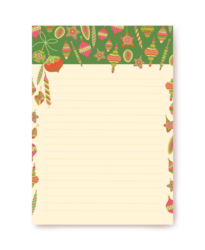 Green garland border with candy canes and star ornaments above lined A5 writing paper