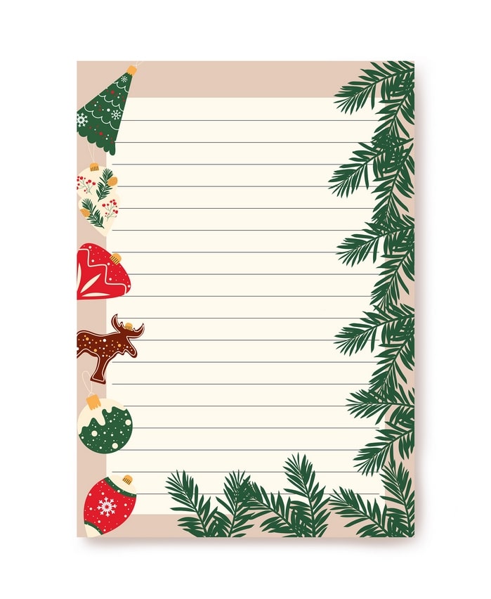 Writing paper with painted Christmas ornaments and pine branches on blush background