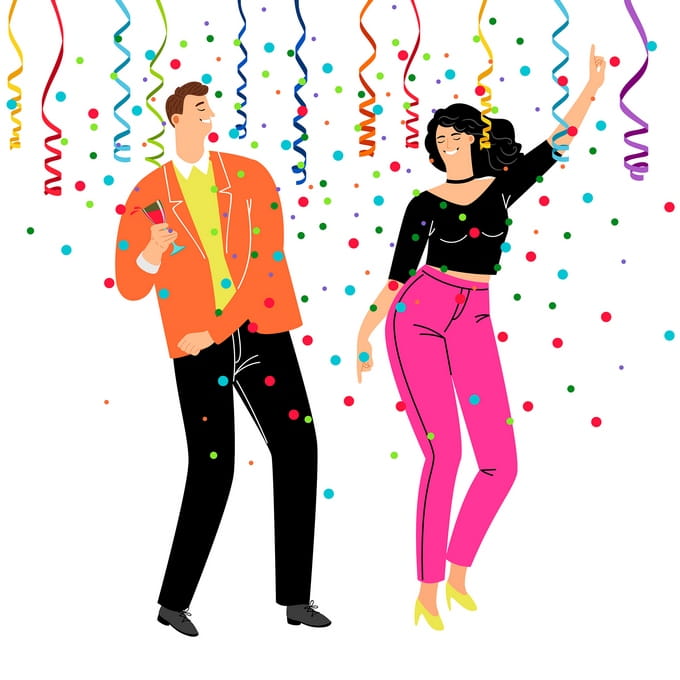 Man in an orange blazer and woman in pink pants dancing under falling confetti and streamers
