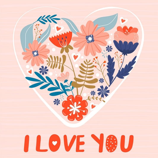 Heart-shaped wreath of orange, navy and pink flowers with an ‘I Love You’ message on pink stripes