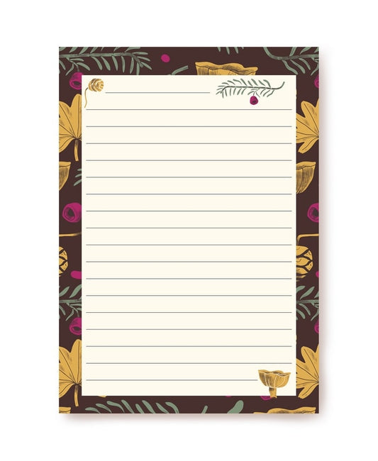 Dark maroon writing paper bordered with mushrooms, ferns and berries