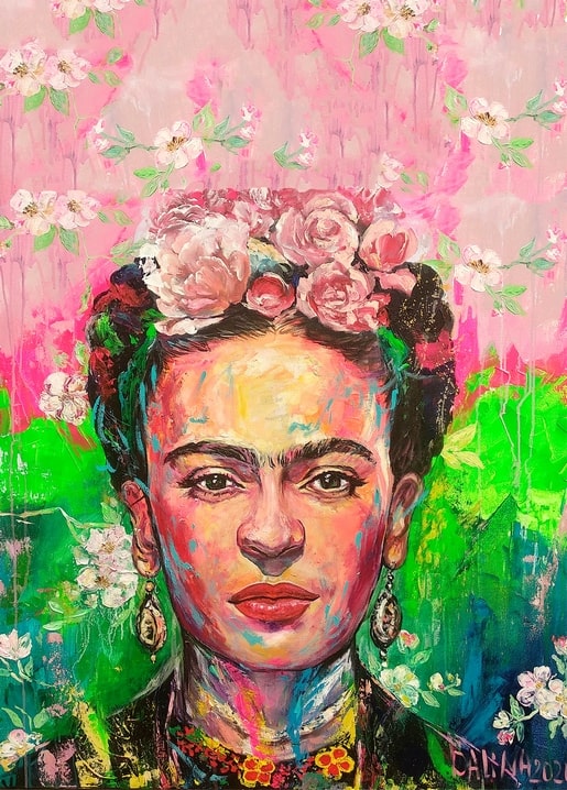 Pastel portrait of Frida Kahlo with pink blossoms against a pink-and-green background, looking at viewer