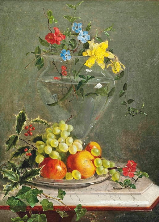 Still life with grapes, oranges, apples and holly beside a glass vase of red, blue and yellow flowers