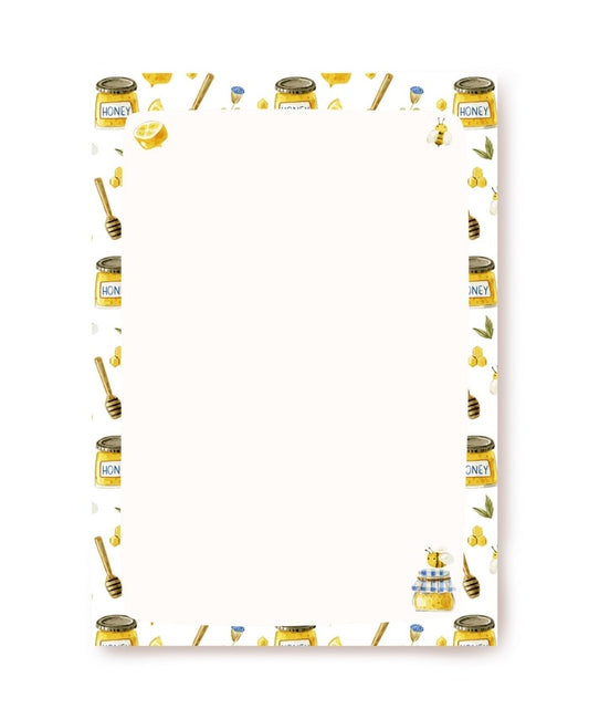 Watercolor honey jars, lemon slice, and bee border on blank A5 writing paper