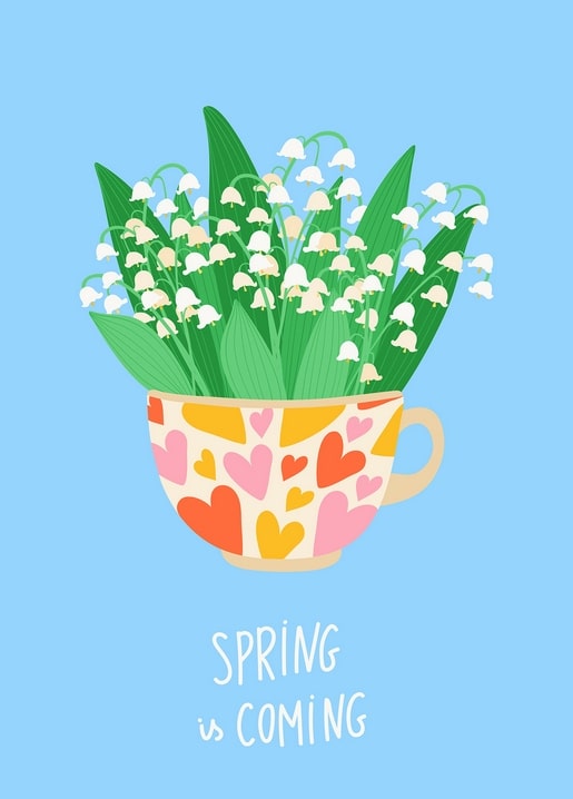 Lily of the valley bouquet in a heart-patterned teacup with 'Spring is coming' text