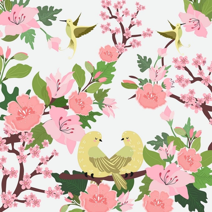 Two lovebirds nestled together on a blossoming cherry branch with hummingbirds flying above