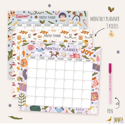 Drei Monatsplaner-Blätter mit Weihnachtsillustrationen und rosa Stift