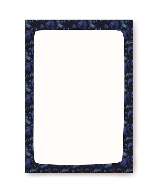 Writing paper with a navy border of moon phases and stars around a cream center