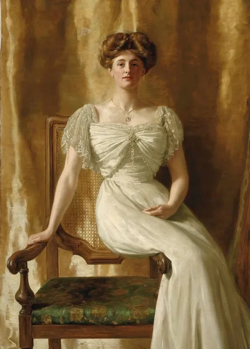 John Collier's Portrait of The Hon. Mrs Harold Ritchie, an Edwardian portrait of a woman in an ivory-white dress seated in an ornate chair