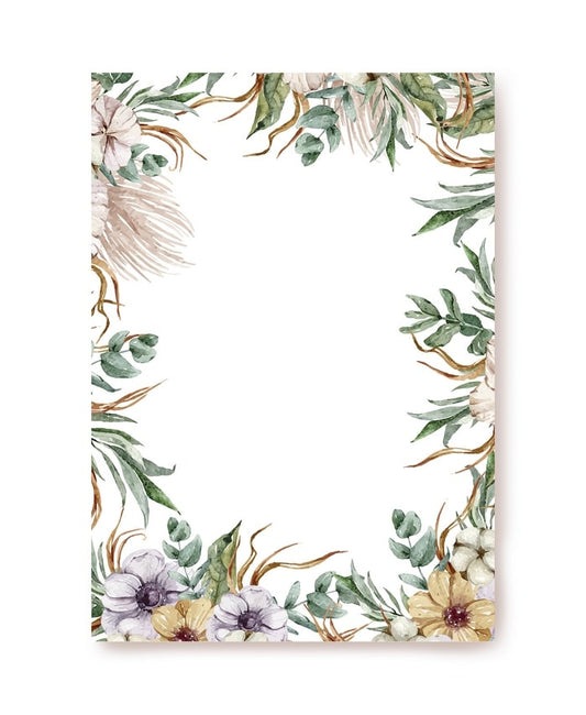 Ivory writing paper framed with pampas grass, eucalyptus, cotton and anemones