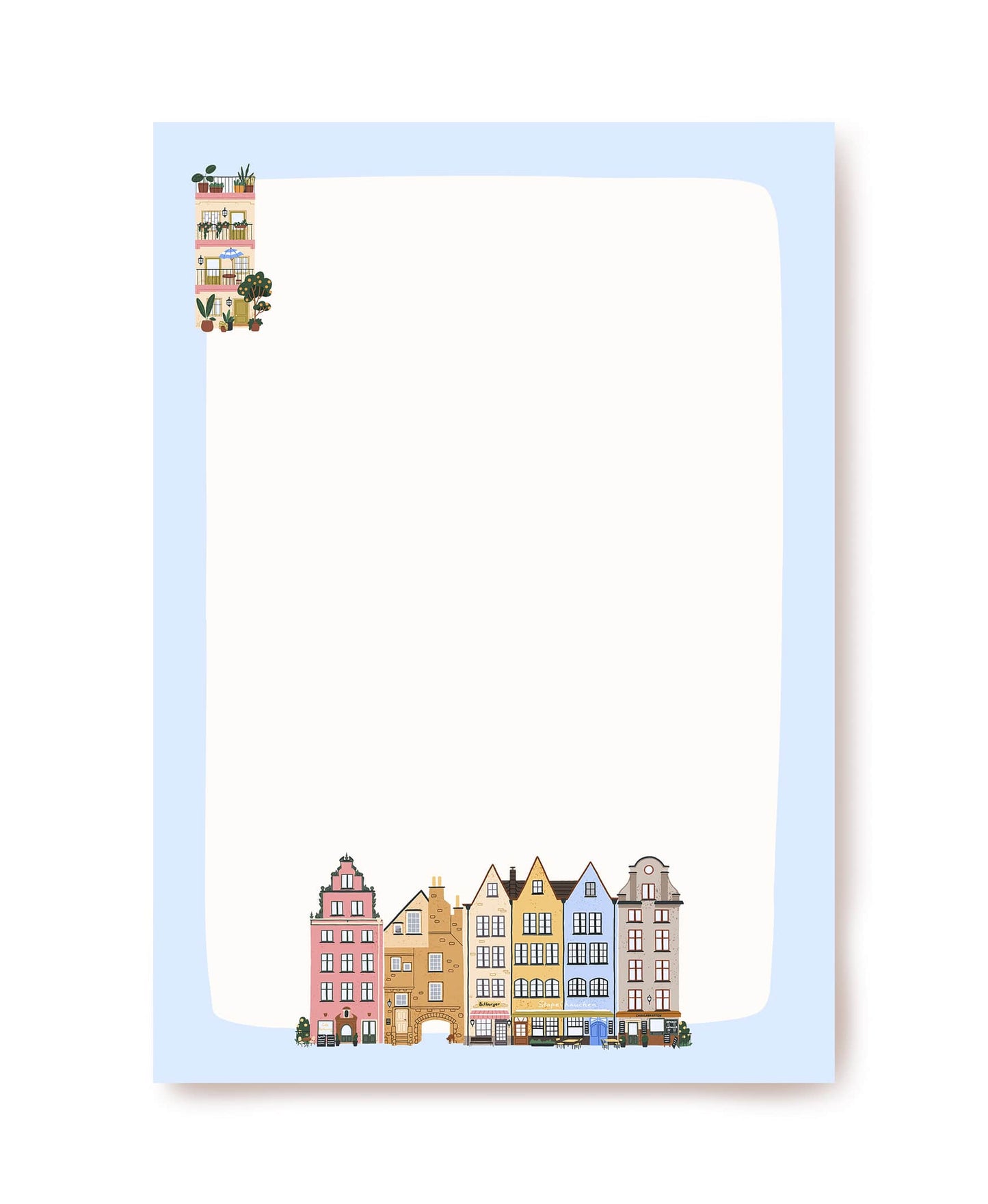 Light blue writing paper with a row of pastel European townhouses and a balcony building in the corner