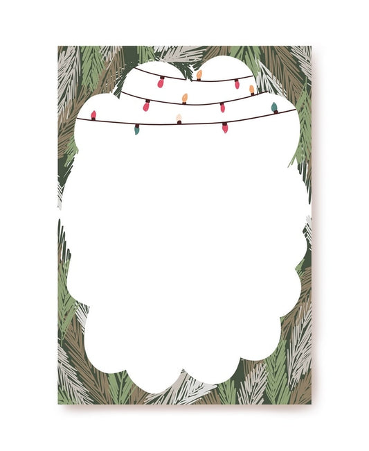 Pine branch border with a festive string of lights on letter paper