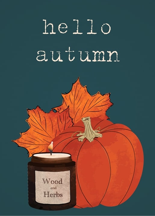 Pumpkin with maple leaves beside a lit Wood and Herbs candle