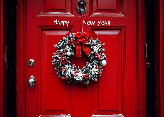 Red front door with a snowflake and berry Christmas wreath and 'Happy New Year' lettering