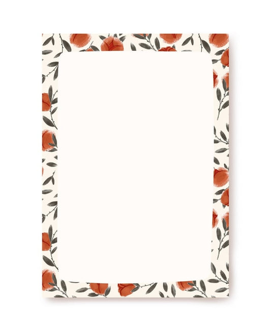 Letter paper bordered with rust watercolor roses and sage leaves on cream