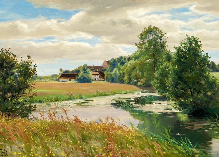 Broad summer river with reeds and buttercups leading to a distant farmstead under cloudy sky