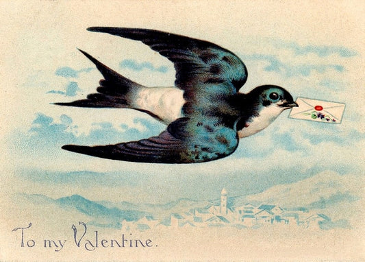 A swallow in flight carrying a sealed envelope over a village skyline