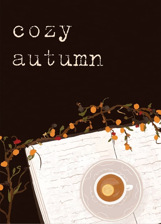 Cup of lemon tea on an open book with a branch of autumn berries