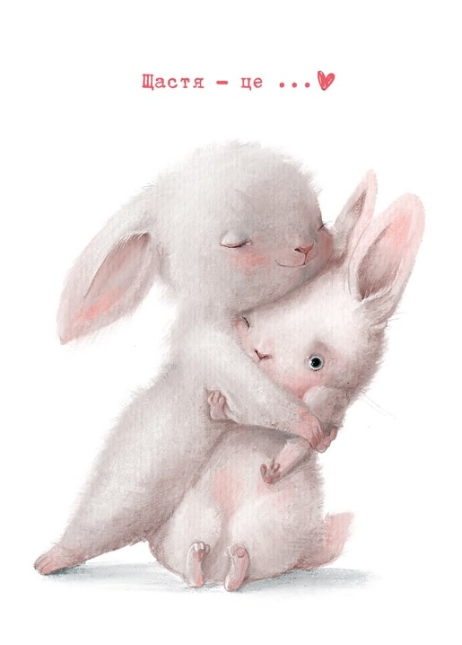 Two pastel bunnies hugging under the words Happiness is... on an illustrated postcard