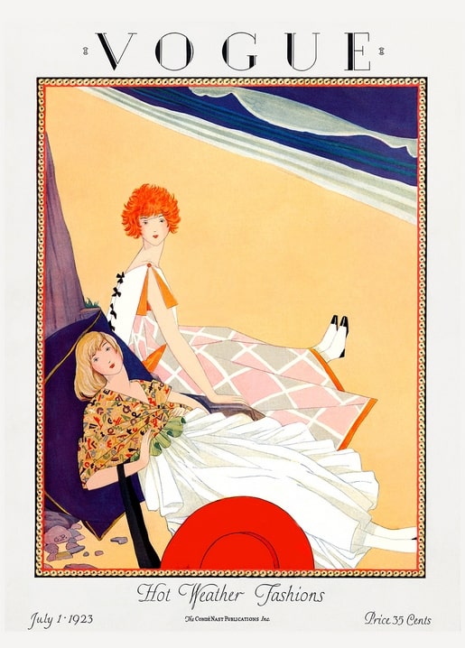 1923 Vogue magazine cover with two women lounging on an orange beach, one in a red hat