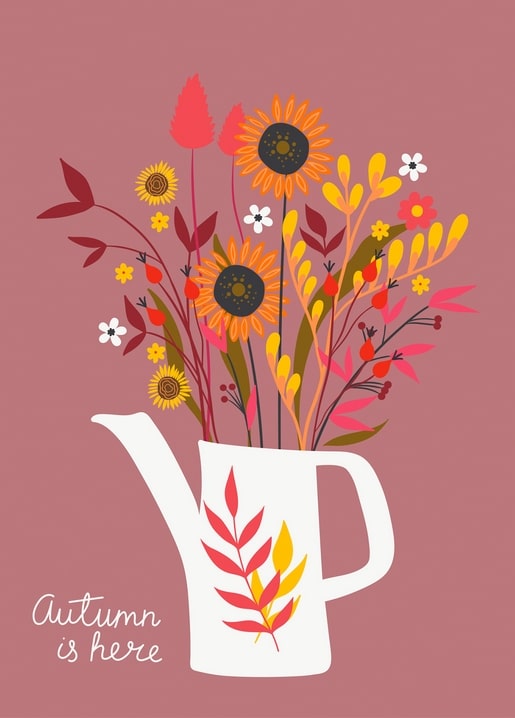 White watering can overflowing with sunflowers, rosehips and dried grasses on a dusty-rose background