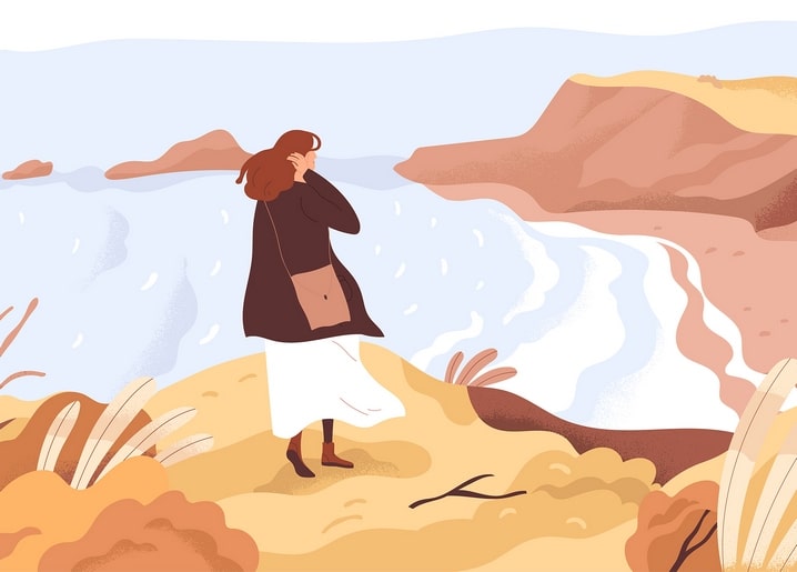 Illustration of a woman walking along a windy autumn coastal cliff above the sea