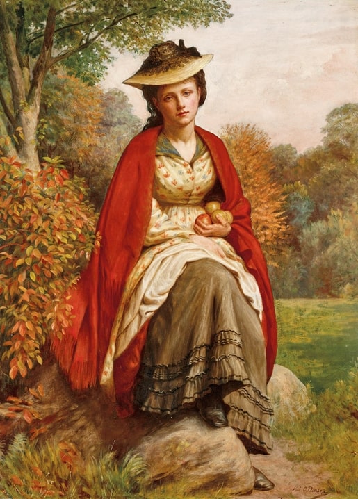 Young woman in a red cloak and straw hat seated on a rock in autumn woods, holding apples