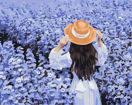 Frau mit Strohhut umgeben von blauen Blüten, Malen-nach-Zahlen-Bild