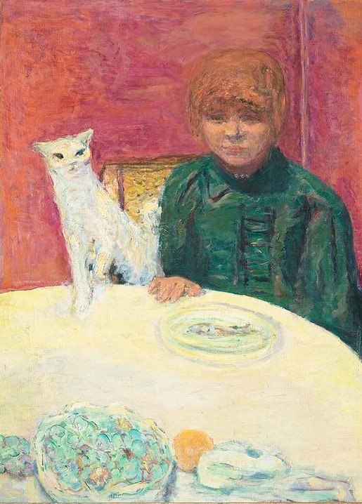Bonnard painting of a woman in green at a table beside an upright white cat expecting food