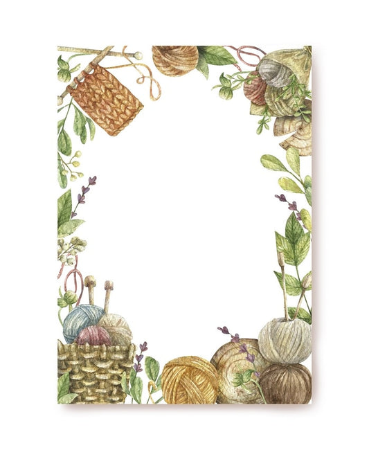 Watercolor letter paper bordered with a yarn basket, knitting needles, and lavender sprigs