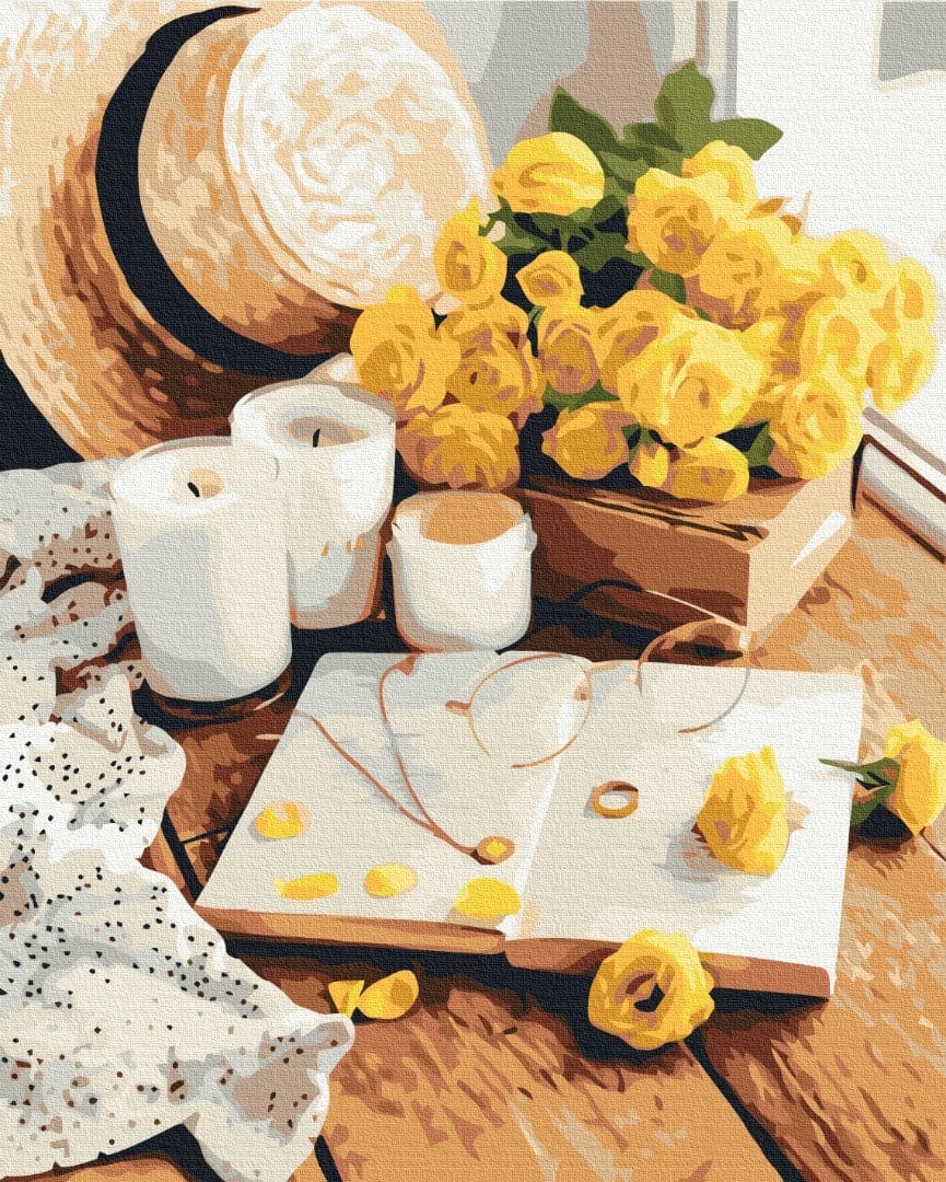 Painting by numbers still life with yellow roses, straw hat, candles and an open book with glasses